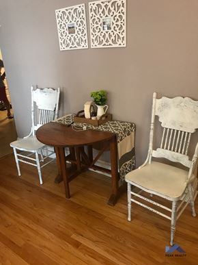 Evanston apartment for rent - a small dining room with a table and three chairs